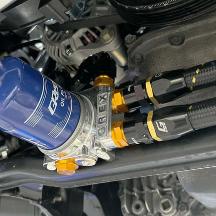 GReddy AN10 Straight Swivel Hose End - Black/Gold Anodized